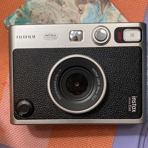 Fuji instax Mini evo hybrid camera.